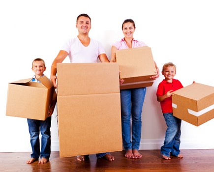 Moving team pricing a small studio removal in Canary Wharf high-rise apartment
