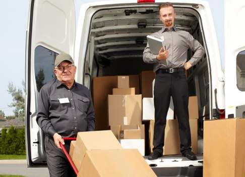 Office packing boxes and labelled cartons for Canary Wharf business moves