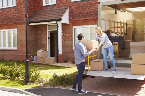 Removal team handling household items during a UK move