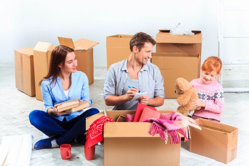 Complaint form and moving boxes representing the first stage of a removals complaint