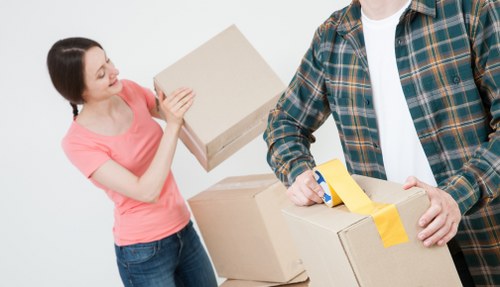 Professional removals service planning a move in a London high-rise