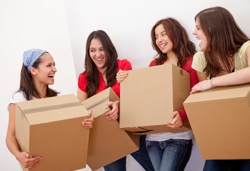 Cubic-yard rate estimate for boxes and furniture in a Canary Wharf flat