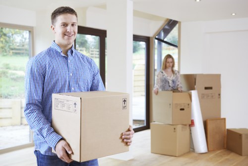 Moving day planning for furniture removals in Canary Wharf with packed items