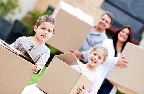 Packed office equipment prepared for commercial move in Canary Wharf